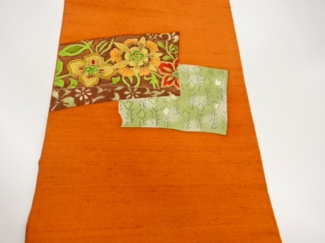  手織り紬金彩色紙に草花模様名古屋帯